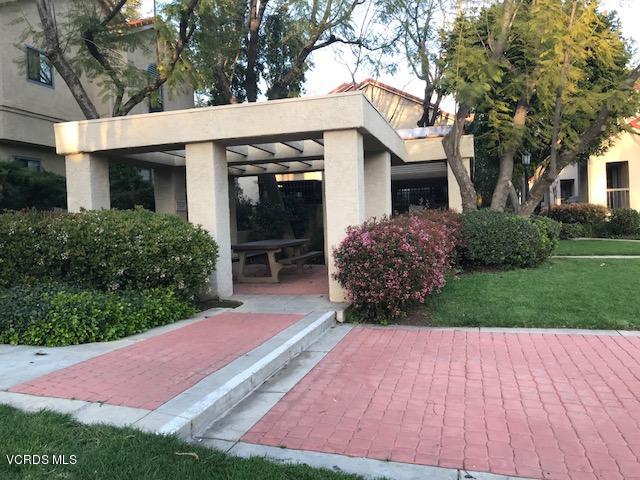 2381 Archwood Lane, Unit 184 Simi Valley, CA 93063 - Photo 30 of 33 a front view of a house with garden