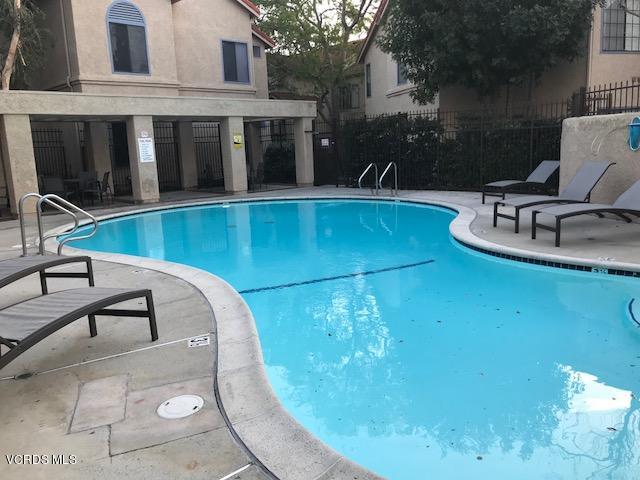 2381 Archwood Lane, Unit 184 Simi Valley, CA 93063 - Photo 32 of 33 a view of a swimming pool with outdoor seating