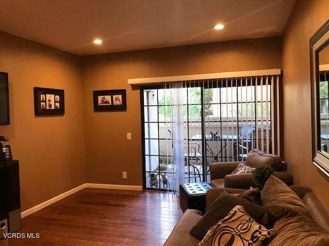 2381 Archwood Lane, Unit 184 Simi Valley, CA 93063 - Photo 5 of 33 a living room with furniture and wooden floor