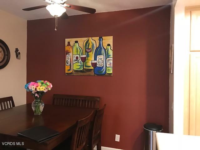 2381 Archwood Lane, Unit 184 Simi Valley, CA 93063 - Photo 6 of 33 a dining room with furniture and wooden floor
