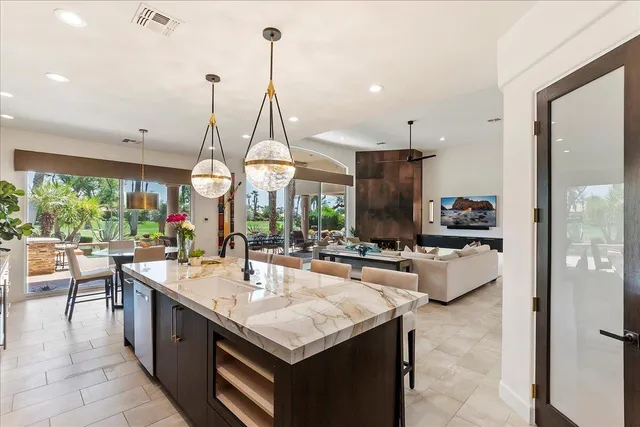 a view of a dining room with furniture window and outside view