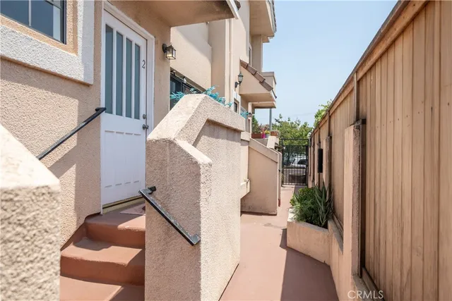 a view of balcony with furniture