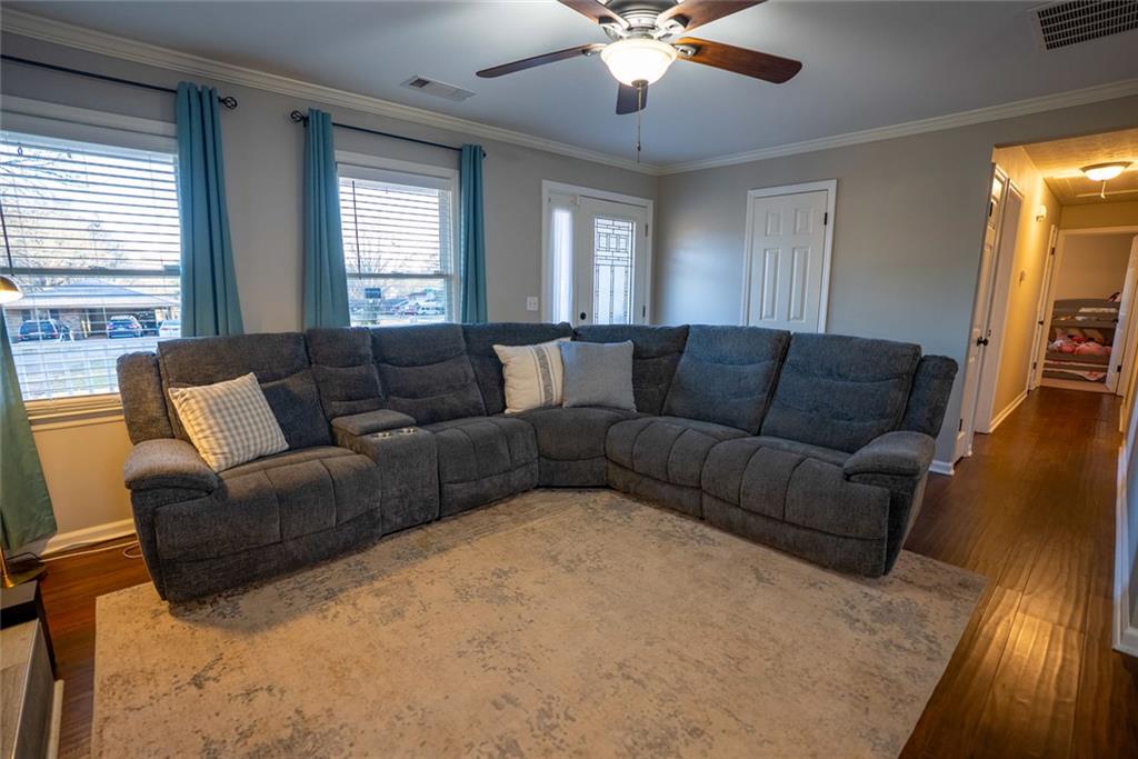 707 Reese Street Monroe, GA 30655 - Photo 14 of 61 a living room with furniture and a large window