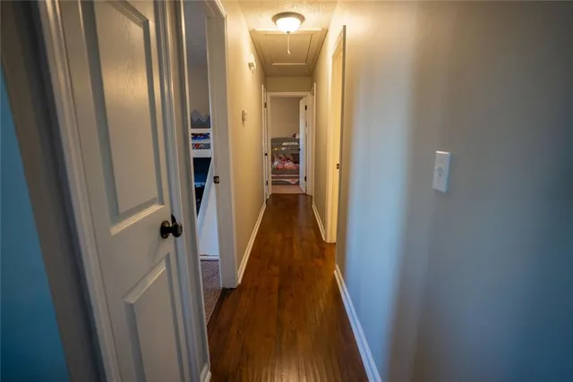 a bed room with a bed and a window