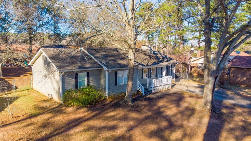 707 Reese Street Monroe, GA 30655 - Photo 37 of 61 a view of a house with a yard
