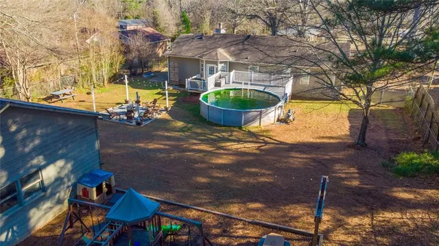 a view of backyard of a house