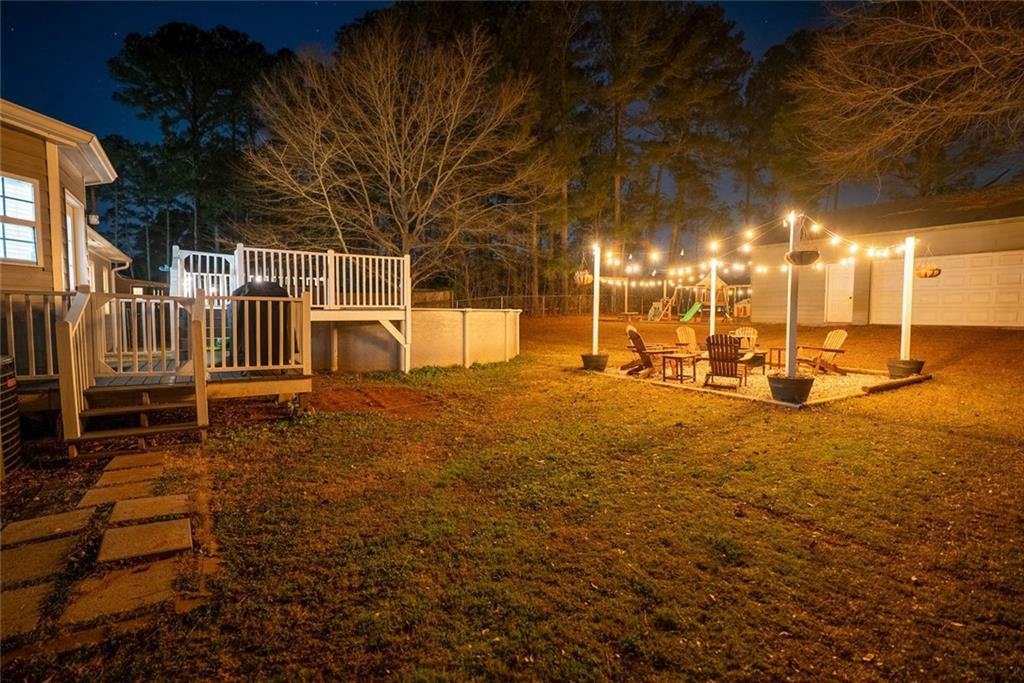 707 Reese Street Monroe, GA 30655 - Photo 47 of 61 a view of a yard with an outdoor space