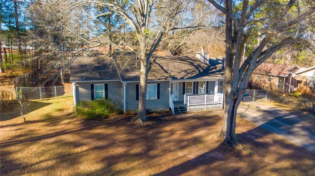 707 Reese Street Monroe, GA 30655 - Photo 59 of 61 a front view of a house with a yard