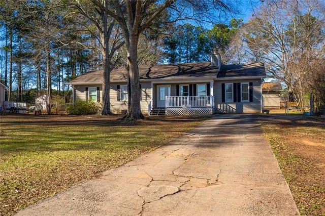 a front view of a house with a porch