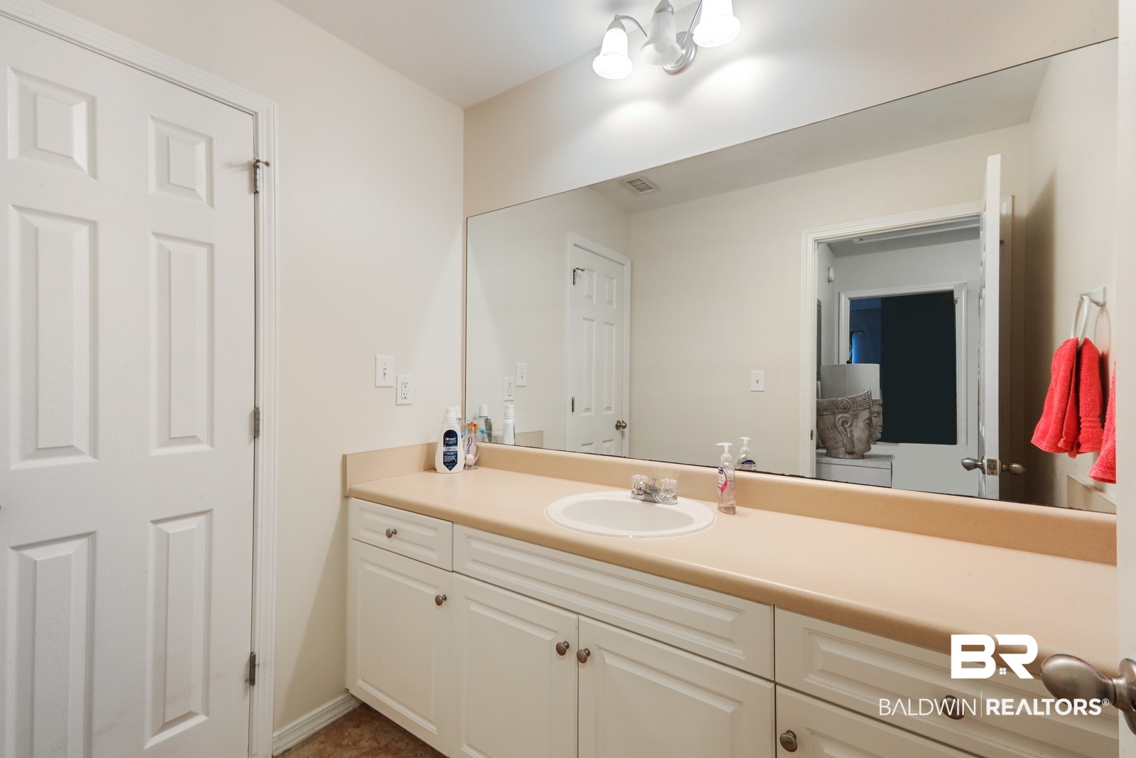 29447 Canal Road Orange Beach, AL 36561 - Photo 9 of 12 Upstairs 2 vanities that share a tub/toilet room