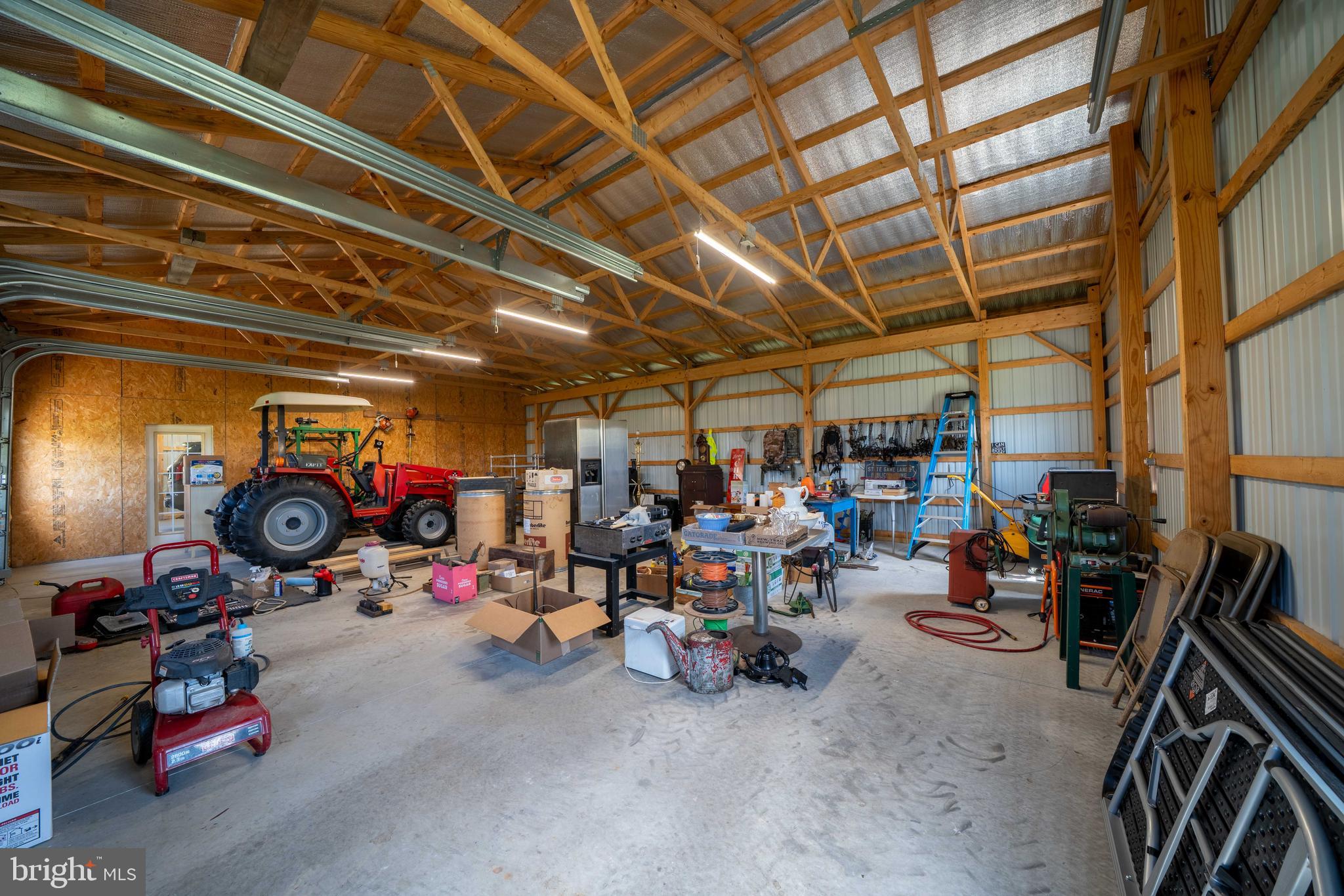 1020 Clark Hill Road Mount Pleasant Mills, PA 17853 - Photo 63 of 76 a view of a garage with rack and bicycle