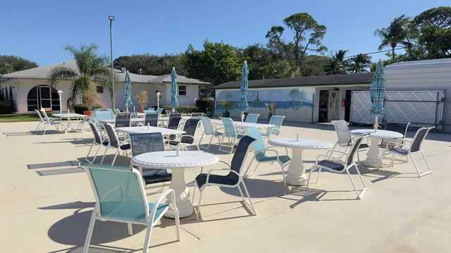 a view of balcony with outdoor space and trees