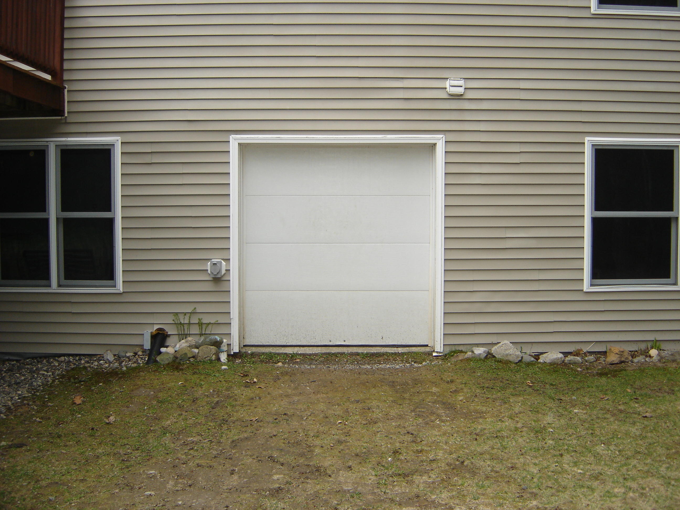87 New Road Casco, ME 04015 - Photo 37 of 52 Overhead Door to Utility Room