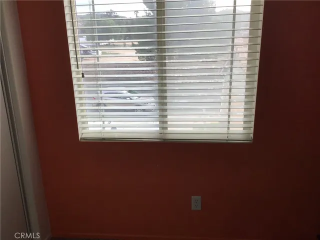 a view of a window in an empty room