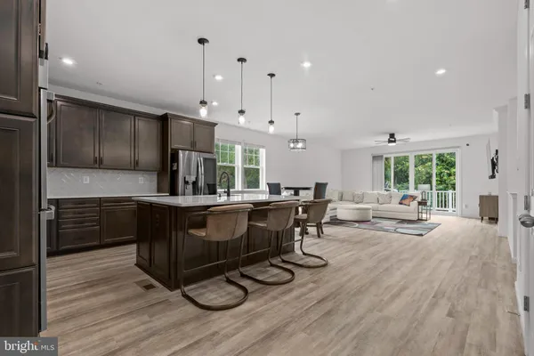 a kitchen with counter top space and appliances