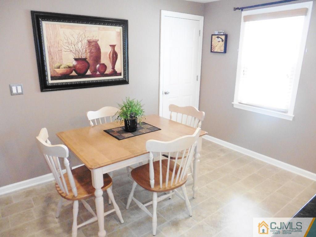 113 Highfield Road Colonia, NJ 07067 - Photo 13 of 25 a dining room with furniture and window