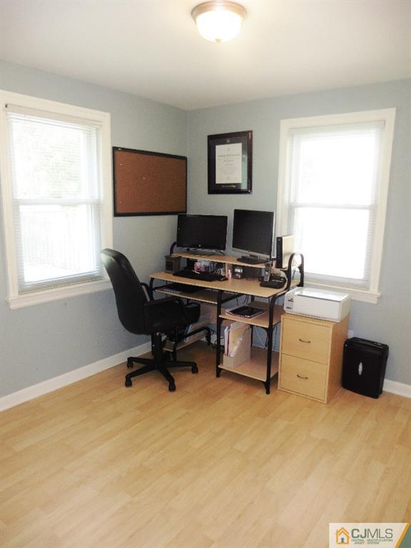 113 Highfield Road Colonia, NJ 07067 - Photo 14 of 25 a workspace with furniture and a window