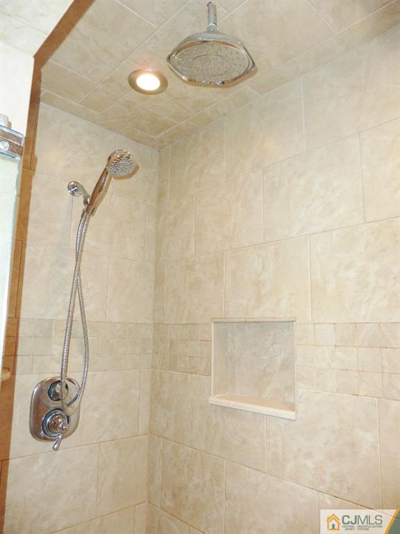 113 Highfield Road Colonia, NJ 07067 - Photo 23 of 25 a bathroom with a shower