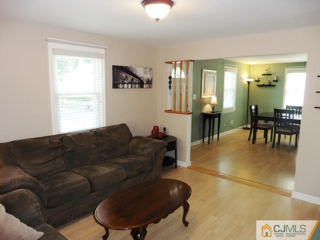 113 Highfield Road Colonia, NJ 07067 - Photo 5 of 25 a living room with furniture and a large window