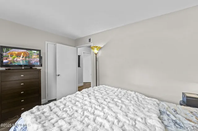 $345,000 | 32 A Plaza De Las Lobos, Freehold, NJ 07728