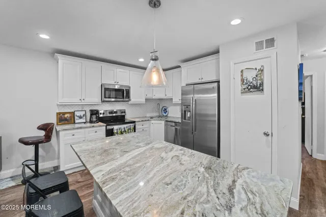 $345,000 | 32 A Plaza De Las Lobos, Freehold, NJ 07728