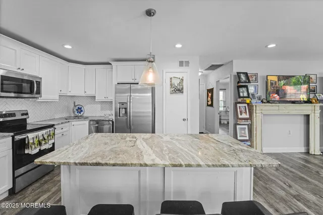 $345,000 | 32 A Plaza De Las Lobos, Freehold, NJ 07728