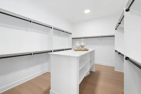 a view of a terrace with a garden and entertaining space