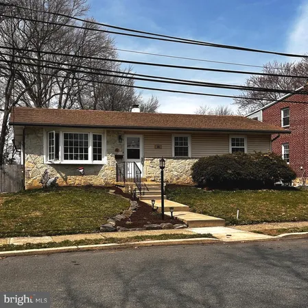 a living room with furniture window and flat screen tv