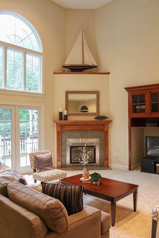 11 Prescott Road Sutton, MA 01588 - Photo 13 of 30 a living room with furniture and a fireplace