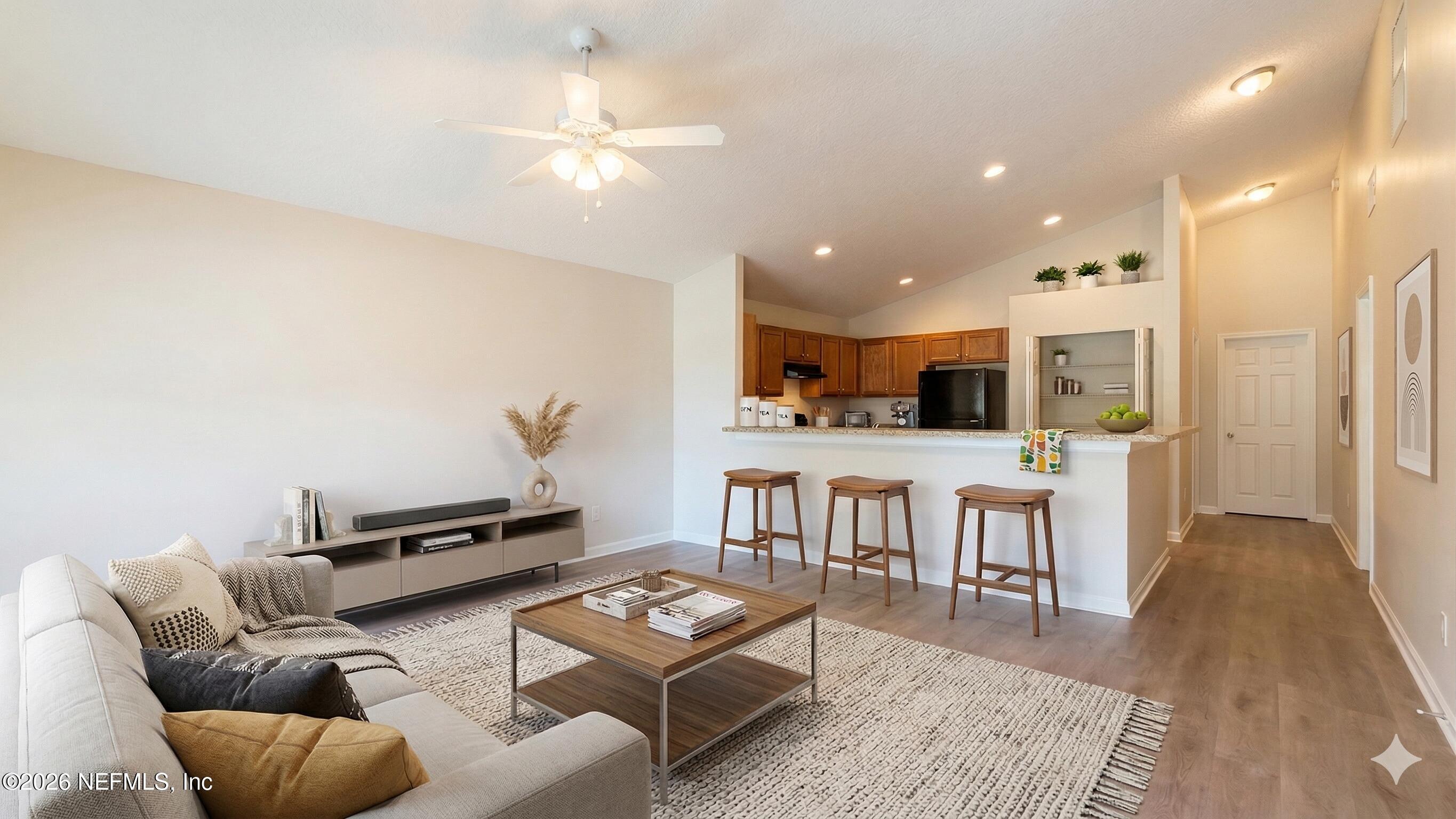 8678 Sibbald Road Jacksonville, FL 32208 - Photo 2 of 24 Living Room - Kitchen