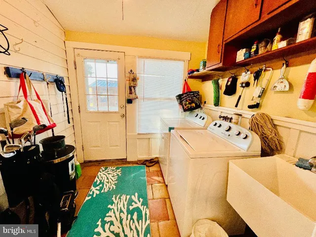 a view of a backyard with sitting area