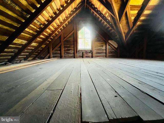 a view of house with backyard space and seating space