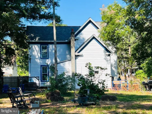 a view of a swimming pool with a yard