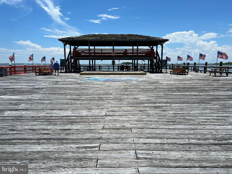 232 North Somerset Avenue Crisfield, MD 21817 - Photo 34 of 42 a view of building with an outdoor space and seating
