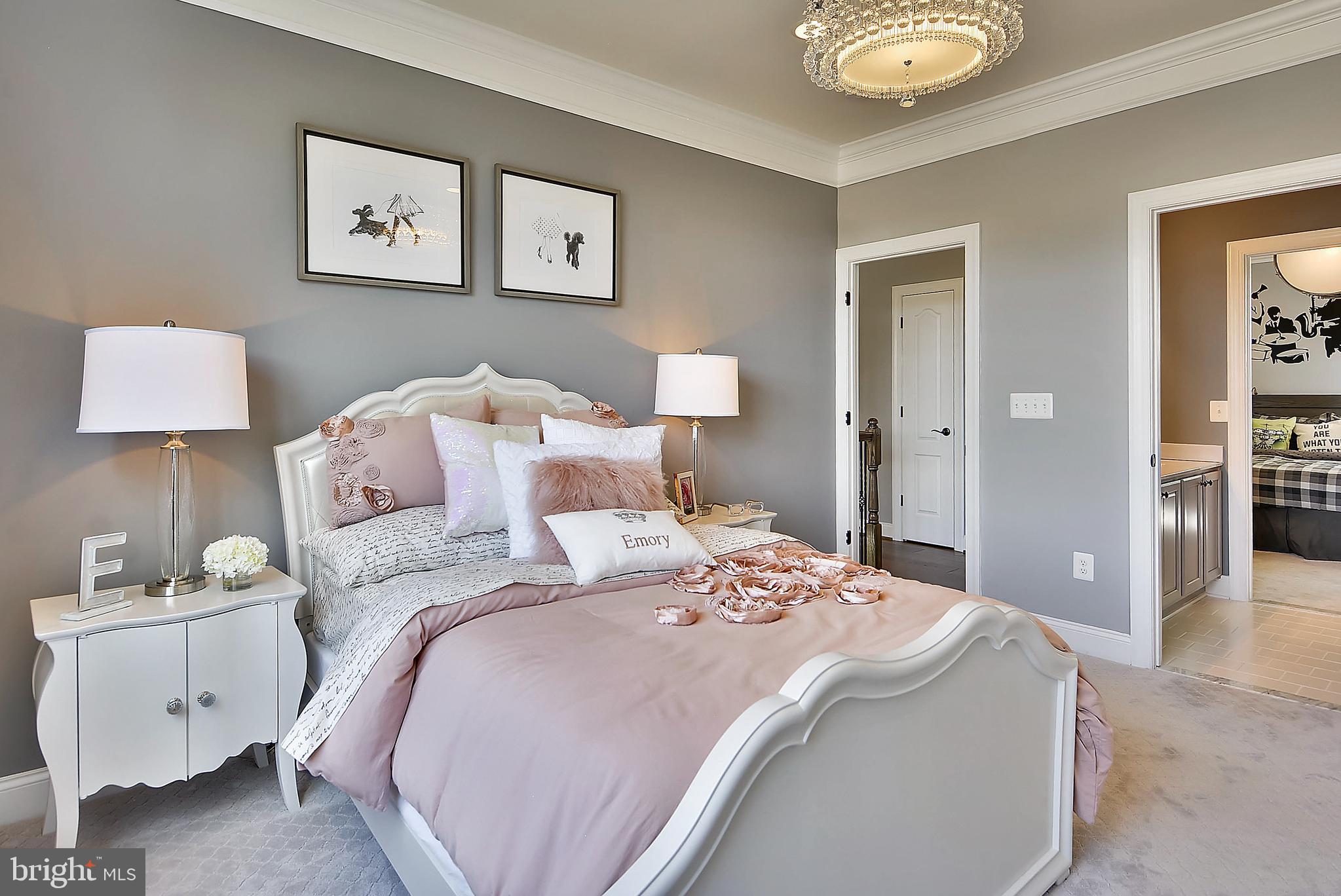 3583 Longleaf Pine Brandywine, MD 20613 - Photo 17 of 27 a bedroom with a bed and a lamp