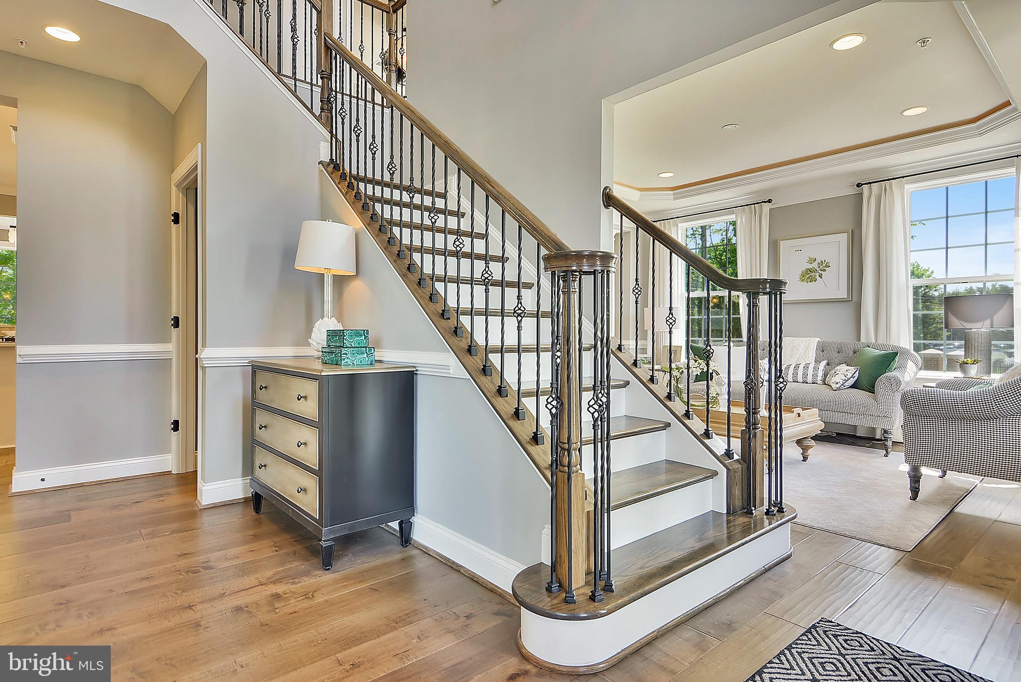 3583 Longleaf Pine Brandywine, MD 20613 - Photo 2 of 27 a view of entryway and hall with wooden floor