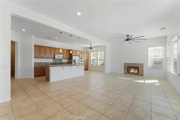 a large kitchen with a lot of counter space and a sink