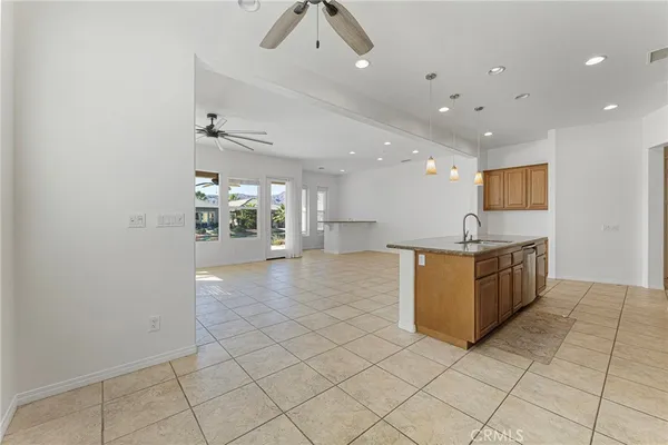 a utility room with sink dryer and washer