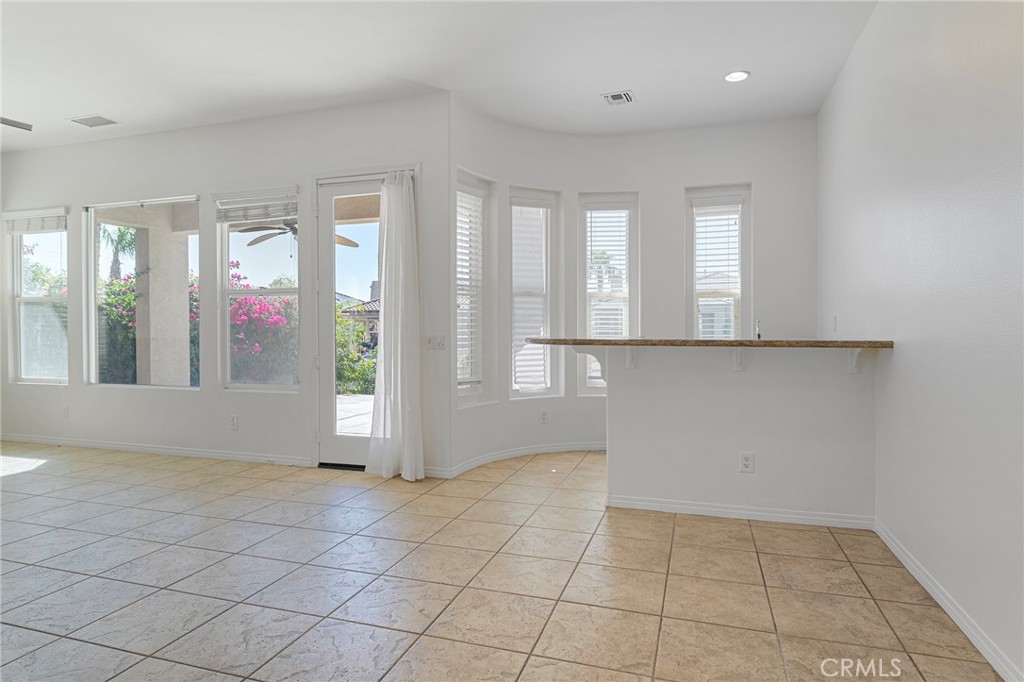 7 Lake Como Court Rancho Mirage, CA 92270 - Photo 24 of 42 an empty room with windows