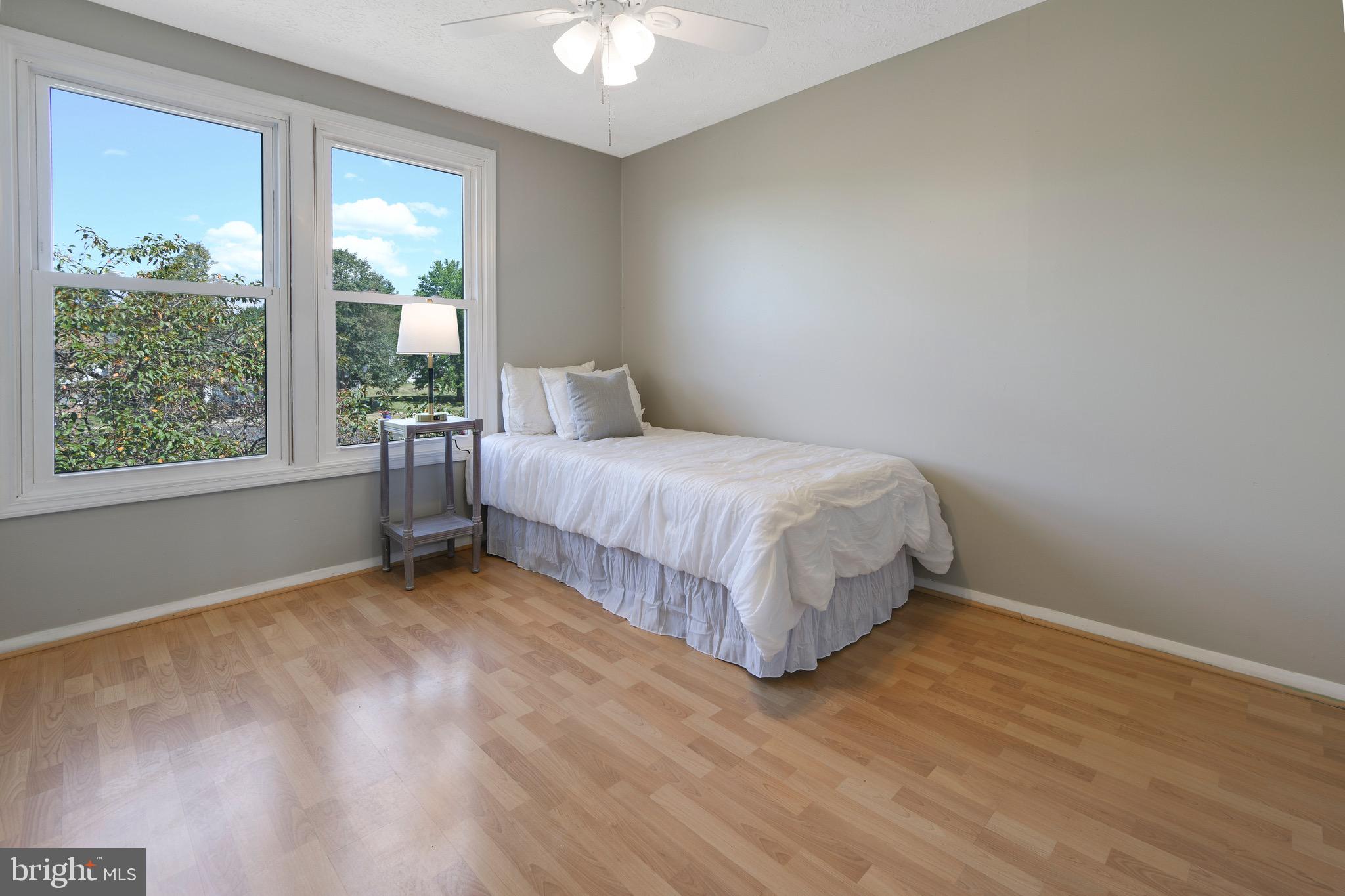 7025 Hames Court Frederick, MD 21703 - Photo 15 of 22 a bedroom with a bed and a window