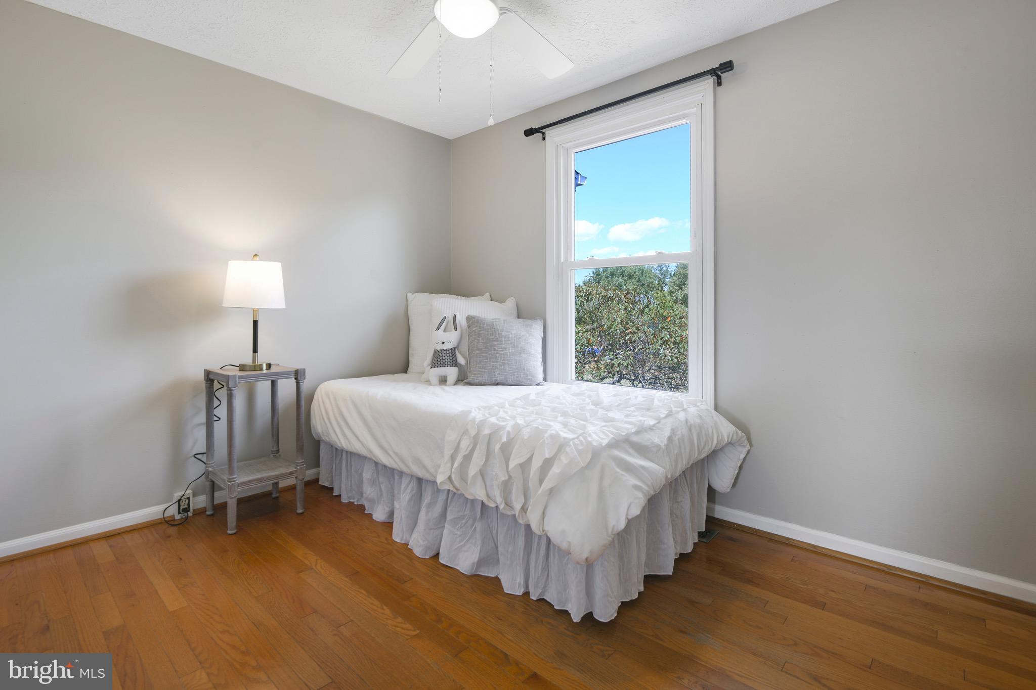 7025 Hames Court Frederick, MD 21703 - Photo 16 of 22 a bedroom with a bed and a window