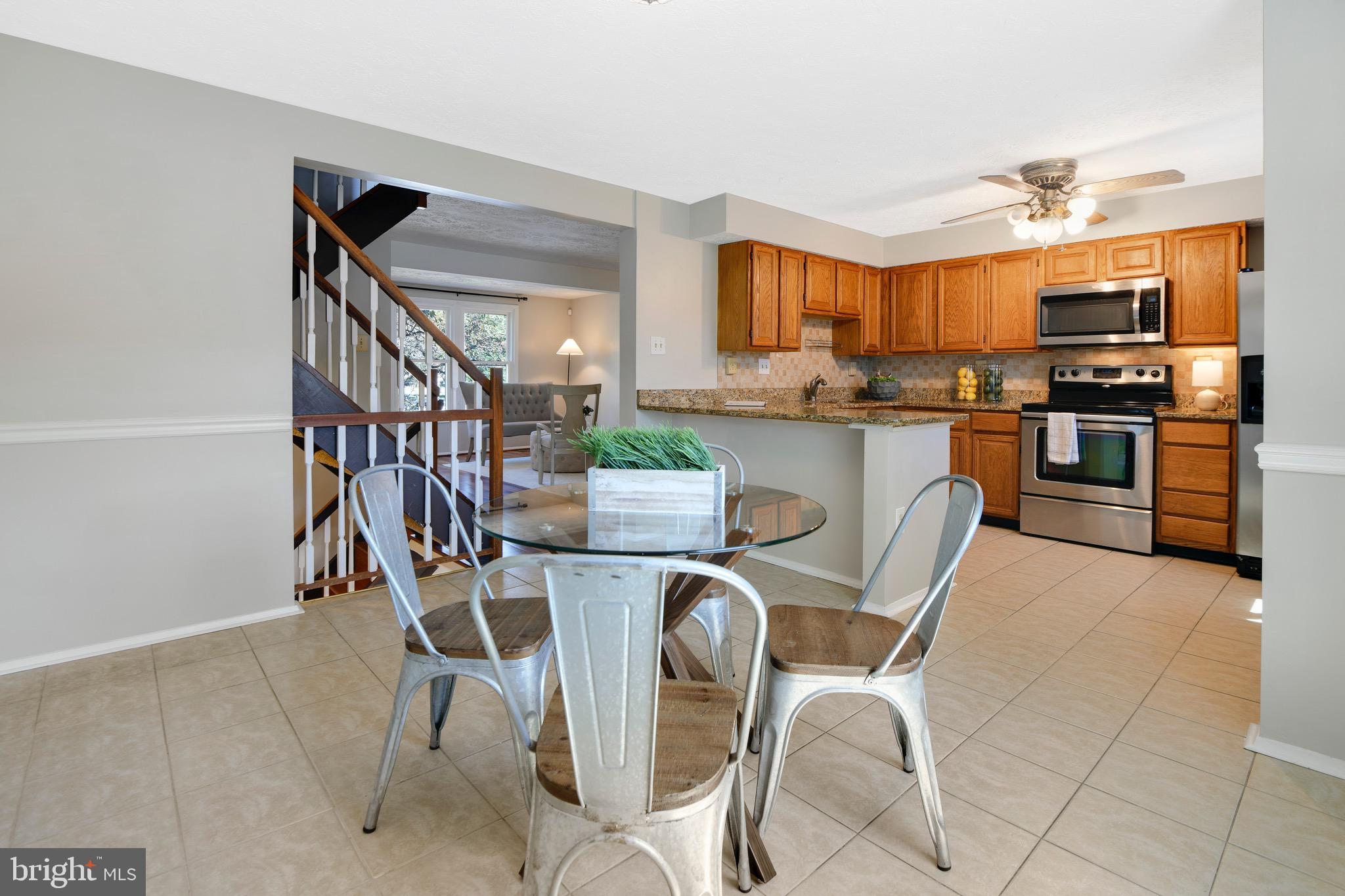 7025 Hames Court Frederick, MD 21703 - Photo 4 of 22 a view of a dining room with furniture