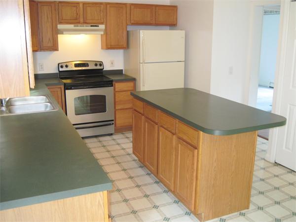 173 East Princeton Road Princeton, MA 01541 - Photo 7 of 30 a kitchen with stainless steel appliances granite countertop a stove a sink and a refrigerator