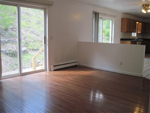173 East Princeton Road Princeton, MA 01541 - Photo 10 of 30 a view of a kitchen with wooden floor and a window