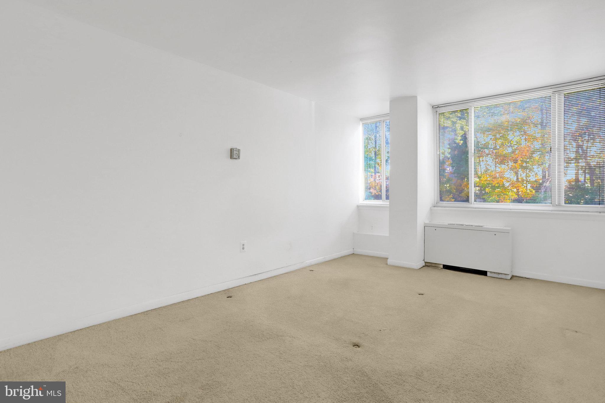 5565 Columbia Pike, Unit 412 Arlington, VA 22204 - Photo 16 of 25 an empty room with windows