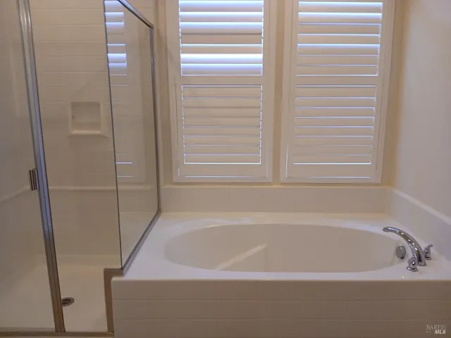 a bathroom with a bathtub