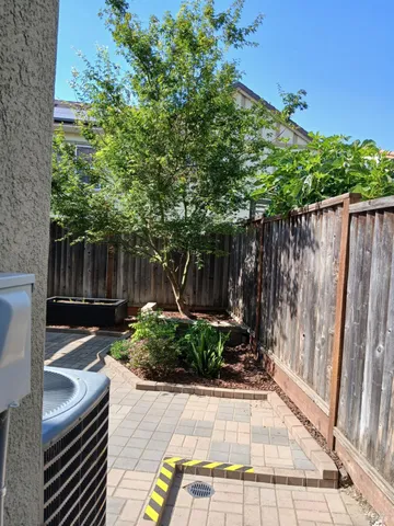 a backyard of a house with lots of green space