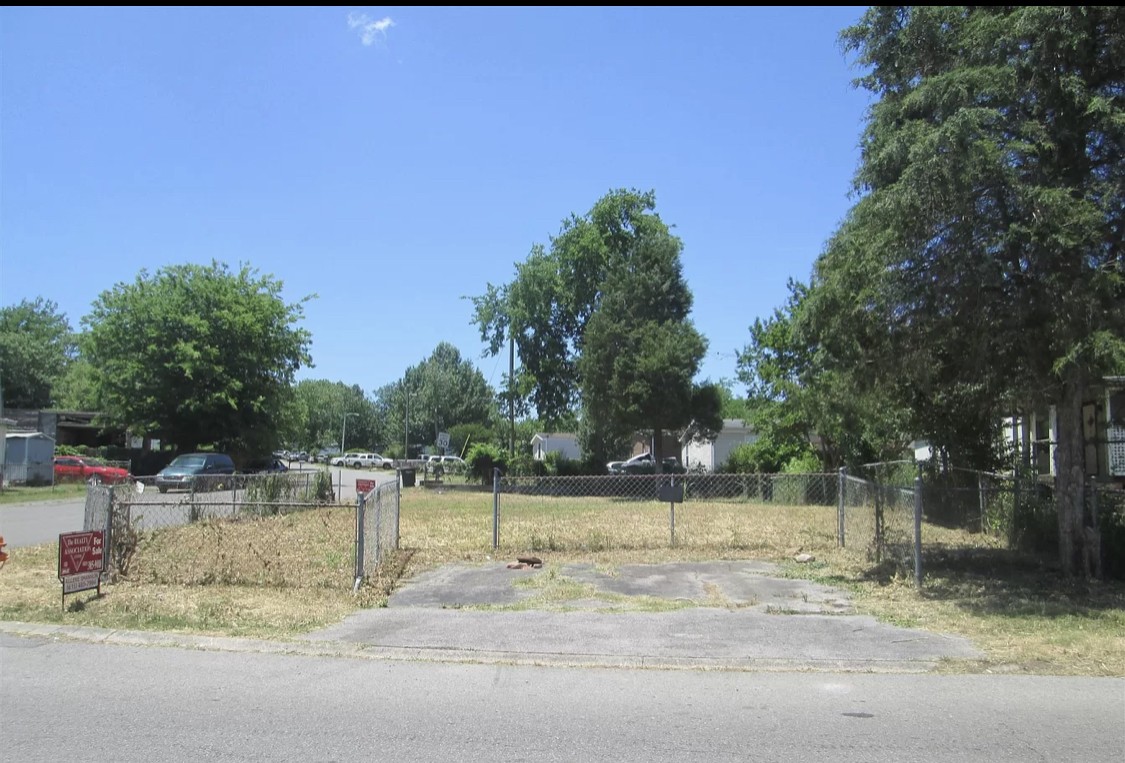 1233 Bubbling Well Road Madison, TN 37115 - Photo 1 of 2 a view of a park with large trees