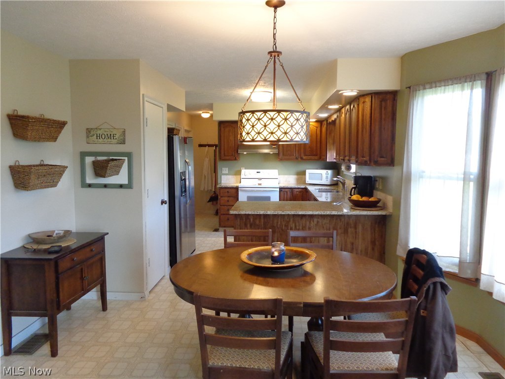 14214 Kneisel Road Vermilion, OH 44089 - Photo 6 of 24 View of the dining area into the kitchen.
