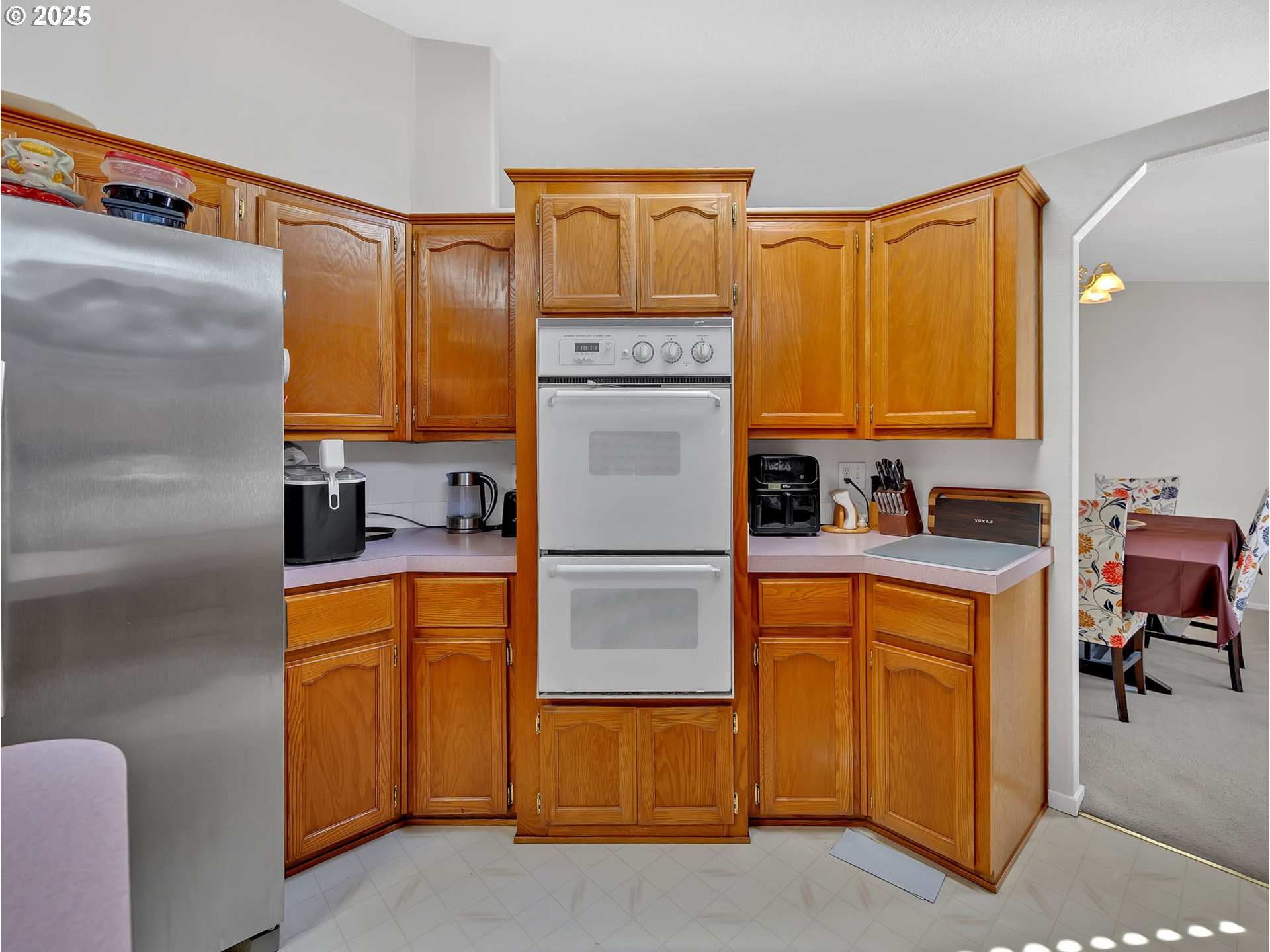 1819 Southeast Orient Drive, Unit 8 Gresham, OR 97080 - Photo 14 of 30 a kitchen with stainless steel appliances a refrigerator and a stove top oven